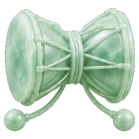 Pale jade carving of a drum (mridanga), the symbol of Dhanishta