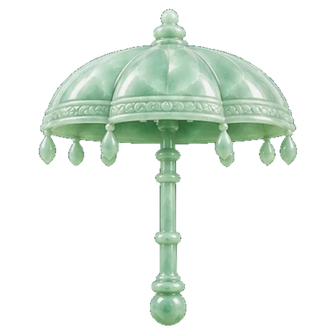 Pale jade carving of a circular amulet, or an umbrella, the symbol of Jyeshtha