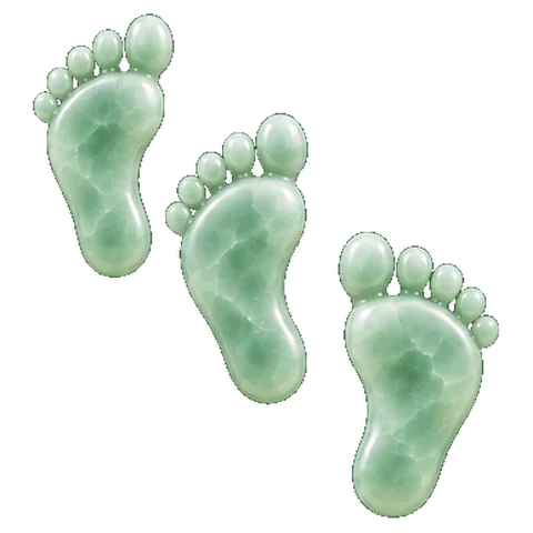 Pale jade carving of an ear, or three footprints, the symbol of Shravana